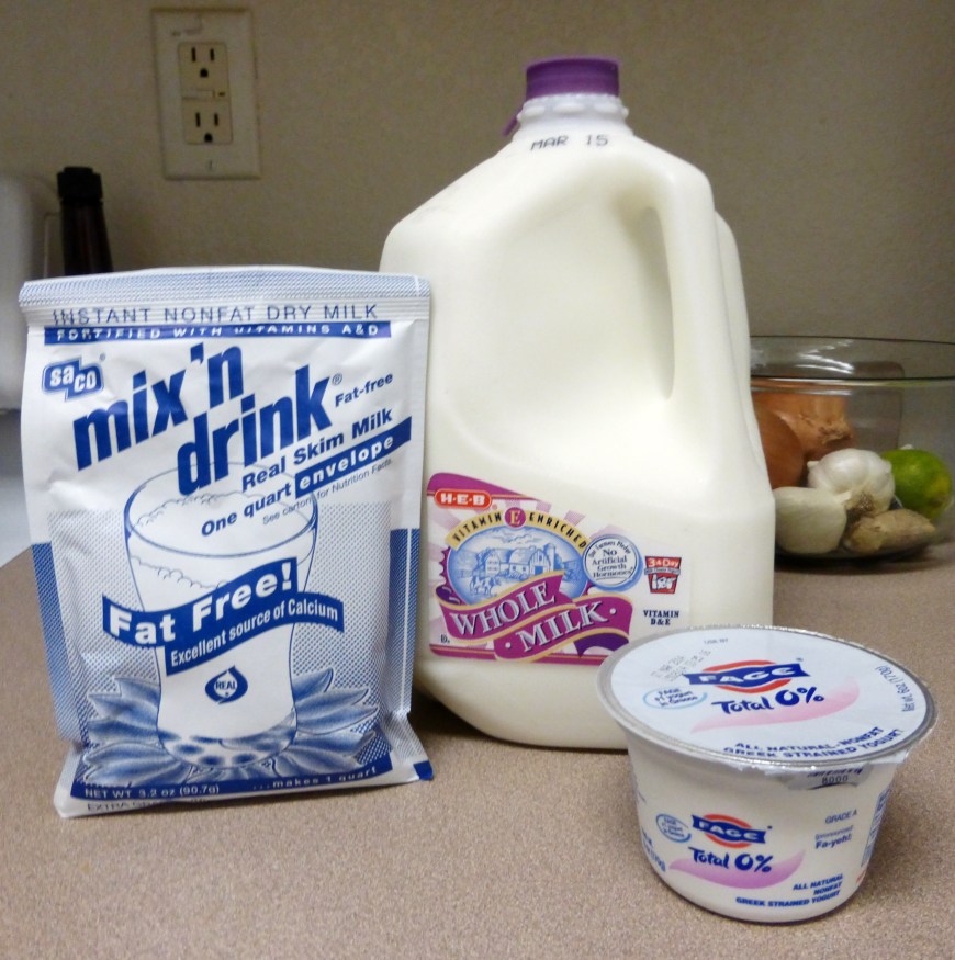 You can find dry milk powder in the baking aisle at the grocery story, where the sweetened condensed and evaporated milk cans are located.  They come in a box, three packets to a box.